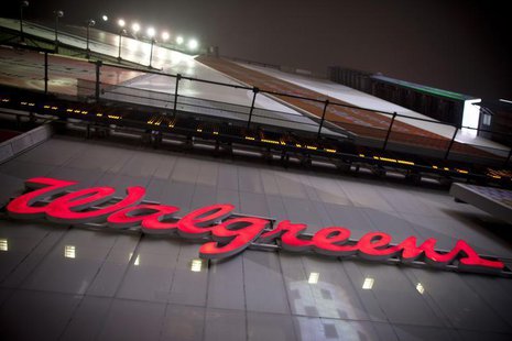 The logo of Walgreens is seen at their Times Square store in New York December 17, 2012. REUTERS/Andrew Kelly The logo of Walgreens is seen at their Times Square store in New York December 17, 2012. REUTERS/Andrew Kelly