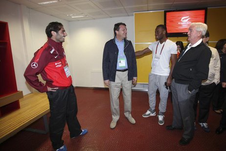 International Olympic Committee (IOC) Vice President and Chairman of the IOC Evaluation Commission Craig Reedie (R), accompanied by Hasan Ar International Olympic Committee (IOC) Vice President and Chairman of the IOC Evaluation Commission Craig Reedie (R), accompanied by Hasan Ar