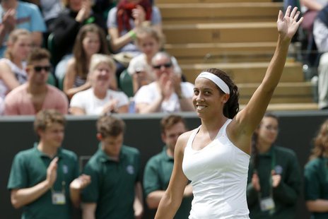 Madison Keys of the U.S. celebrates after defeating Heather Watson of Britain in their women's singles tennis match at the Wimbledon Tennis Madison Keys of the U.S. celebrates after defeating Heather Watson of Britain in their women's singles tennis match at the Wimbledon Tennis
