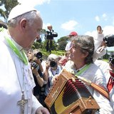 Pope Francis (L) greets musicians as he welcomes more than 250 children who arrived after travelling by train from Milan at the St. Peter tr Pope Francis (L) greets musicians as he welcomes more than 250 children who arrived after travelling by train from Milan at the St. Peter tr