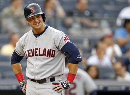Cleveland Indians' Nick Swisher reacts to striking out against the New York Yankees during the first inning of their MLB American League bas Cleveland Indians' Nick Swisher reacts to striking out against the New York Yankees during the first inning of their MLB American League bas
