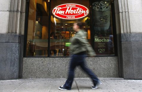 A pedestrian walks past a Tim Hortons restaurant in Toronto October 26, 2007. REUTERS/Mark Blinch A pedestrian walks past a Tim Hortons restaurant in Toronto October 26, 2007. REUTERS/Mark Blinch