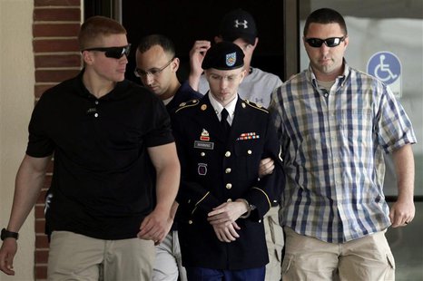 U.S. Army Private First Class Bradley Manning (C) is escorted from the courtroom after a day of his court martial trial at Fort Meade, Maryl U.S. Army Private First Class Bradley Manning (C) is escorted from the courtroom after a day of his court martial trial at Fort Meade, Maryl