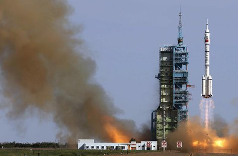 The Long March 2-F rocket loaded with Shenzhou-10 manned spacecraft carrying Chinese astronauts Nie Haisheng, Zhang Xiaoguang and Wang Yapin The Long March 2-F rocket loaded with Shenzhou-10 manned spacecraft carrying Chinese astronauts Nie Haisheng, Zhang Xiaoguang and Wang Yapin