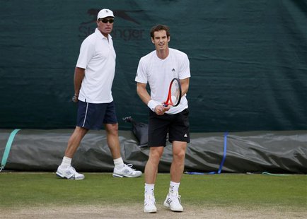 Andy Murray of Britain (R) trains with his coach Ivan Lendl during a training session at the Wimbledon Tennis Championships, in London June Andy Murray of Britain (R) trains with his coach Ivan Lendl during a training session at the Wimbledon Tennis Championships, in London June