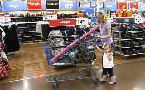 A woman shops with her daughter at a Walmart Supercenter in Rogers, Arkansas June 6, 2013. REUTERS/Rick Wilking A woman shops with her daughter at a Walmart Supercenter in Rogers, Arkansas June 6, 2013. REUTERS/Rick Wilking
