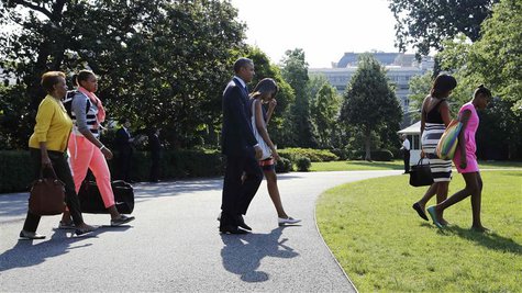 U.S. President Barack Obama (C) and his family walk to the helicopter to depart for travel to Africa from the South Lawn of the White House U.S. President Barack Obama (C) and his family walk to the helicopter to depart for travel to Africa from the South Lawn of the White House