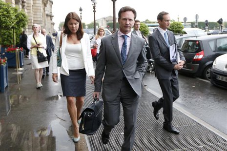 Red Bull team principal Christian Horner (C) arrives to attend an hearing at the FIA headquarters in Paris June 20, 2013. REUTERS/Charles Pl Red Bull team principal Christian Horner (C) arrives to attend an hearing at the FIA headquarters in Paris June 20, 2013. REUTERS/Charles Pl