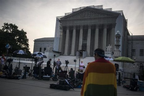 Journalists stake out positions early in the morning to report on decisions expected in two cases regarding same-sex marriage at the U.S. Su Journalists stake out positions early in the morning to report on decisions expected in two cases regarding same-sex marriage at the U.S. Su