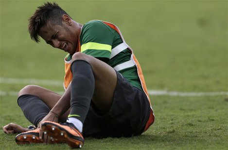 Brazil's national soccer team player Neymar reacts during a training session in Belo Horizonte June 25, 2013. Brazil will play against Urugu Brazil's national soccer team player Neymar reacts during a training session in Belo Horizonte June 25, 2013. Brazil will play against Urugu