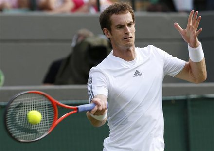 Andy Murray of Britain hits a return to Lu Yen-Hsun of Taiwan in their men's singles tennis match at the Wimbledon Tennis Championships, in Andy Murray of Britain hits a return to Lu Yen-Hsun of Taiwan in their men's singles tennis match at the Wimbledon Tennis Championships, in