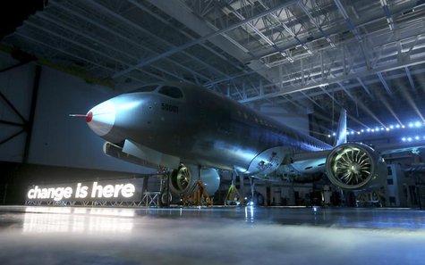 Bombardier unveils its CSeries aircraft at a news conference at its assembly facility in Mirabel, Quebec, March 7, 2013. REUTERS/Christinne Bombardier unveils its CSeries aircraft at a news conference at its assembly facility in Mirabel, Quebec, March 7, 2013. REUTERS/Christinne