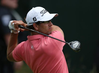 Australia's Adam Scott tees off on the 18th hole during the second round of the 2013 U.S. Open golf championship at the Merion Golf Club in Australia's Adam Scott tees off on the 18th hole during the second round of the 2013 U.S. Open golf championship at the Merion Golf Club in