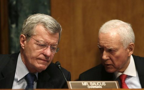 Senator Max Baucus (D-MT) (L), the chairman of the Senate Finance Committee, and Senator Orrin Hatch (R-UT), the co-chair, confer during tes Senator Max Baucus (D-MT) (L), the chairman of the Senate Finance Committee, and Senator Orrin Hatch (R-UT), the co-chair, confer during tes