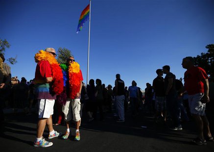 Vinnie Pharas (L) and Darryl Duran (R) attend a rally in support of the United States Supreme Court decision on marriage rights in San Diego Vinnie Pharas (L) and Darryl Duran (R) attend a rally in support of the United States Supreme Court decision on marriage rights in San Diego