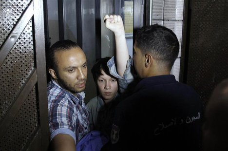 Marguerite Stern of France, a member of the women's rights group Femen, gestures after she is released from prison in Tunis June 27, 2013. A Marguerite Stern of France, a member of the women's rights group Femen, gestures after she is released from prison in Tunis June 27, 2013. A
