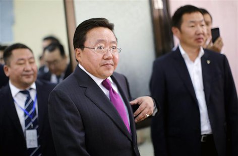 Mongolia's President and presidential candidate for re-election Tsakhia Elbegdorj arrives at a polling station to cast his vote during Mongo Mongolia's President and presidential candidate for re-election Tsakhia Elbegdorj arrives at a polling station to cast his vote during Mongo