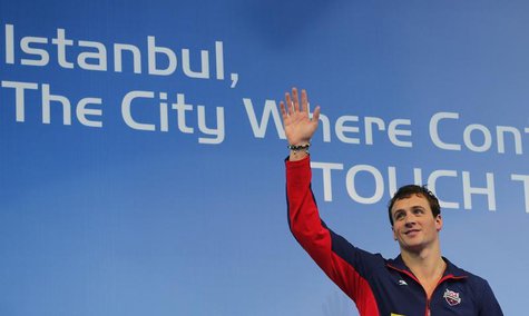 Gold medallist Ryan Lochte of the U.S. waves during the award ceremony for the men's 100m individual medley final during the FINA World Swim Gold medallist Ryan Lochte of the U.S. waves during the award ceremony for the men's 100m individual medley final during the FINA World Swim