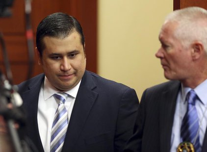 George Zimmerman enters the courtroom for his second-degree murder trial for the 2012 shooting death of Trayvon Martin in Seminole circuit c George Zimmerman enters the courtroom for his second-degree murder trial for the 2012 shooting death of Trayvon Martin in Seminole circuit c