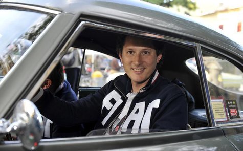 Fiat Chairman John Elkann drives a Fiat 8V at the start of the "1000 Miglia" International classic car rally in Brescia, May 17, 2012. REUTE Fiat Chairman John Elkann drives a Fiat 8V at the start of the "1000 Miglia" International classic car rally in Brescia, May 17, 2012. REUTE