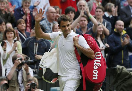 Roger Federer of Switzerland walks off the court after being defeated by Sergiy Stakhovsky of Ukraine in their men's singles tennis match at Roger Federer of Switzerland walks off the court after being defeated by Sergiy Stakhovsky of Ukraine in their men's singles tennis match at