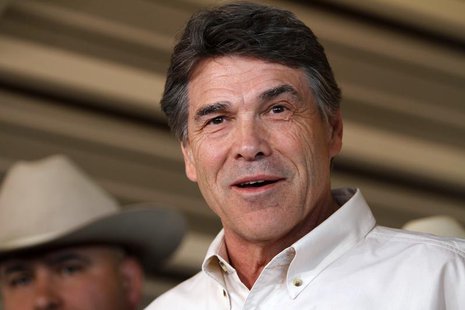 Texas Governor Rick Perry answers questions from the media after taking an aerial tour over the fertilizer plant explosion site in West, Tex Texas Governor Rick Perry answers questions from the media after taking an aerial tour over the fertilizer plant explosion site in West, Tex