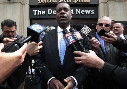 Detroit's Emergency Financial Manager Kevyn Orr talks to members of the media outside the Detroit Newspapers building about the report he de Detroit's Emergency Financial Manager Kevyn Orr talks to members of the media outside the Detroit Newspapers building about the report he de