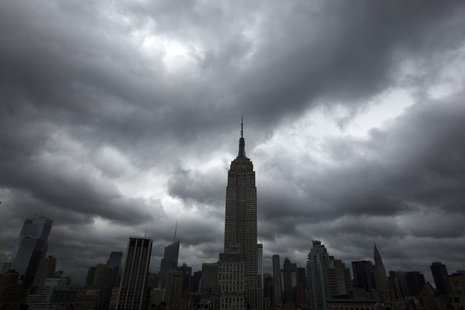 Storm clouds pass over the top of the Empire State Building in New York, June 13, 2013. REUTERS/Lucas Jackson Storm clouds pass over the top of the Empire State Building in New York, June 13, 2013. REUTERS/Lucas Jackson