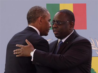U.S. President Barack Obama (L) and Senegal President Macky Sall embrace after their joint news conference at the Presidential Palace June 2 U.S. President Barack Obama (L) and Senegal President Macky Sall embrace after their joint news conference at the Presidential Palace June 2