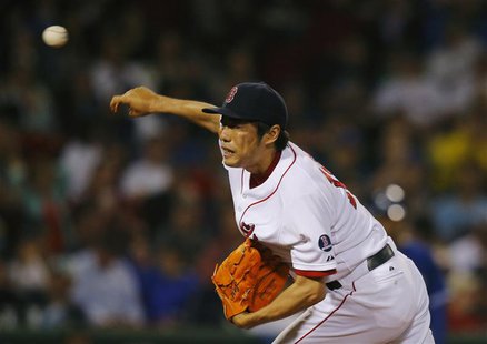 Boston Red Sox Koji Uehara pitches against the Toronto Blue Jays in the ninth inning of their MLB American League baseball game at Fenway Pa Boston Red Sox Koji Uehara pitches against the Toronto Blue Jays in the ninth inning of their MLB American League baseball game at Fenway Pa