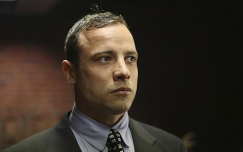 Oscar Pistorius enters the dock before in court proceedings at the Pretoria Magistrates court June 4, 2013. REUTERS/Siphiwe Sibeko Oscar Pistorius enters the dock before in court proceedings at the Pretoria Magistrates court June 4, 2013. REUTERS/Siphiwe Sibeko
