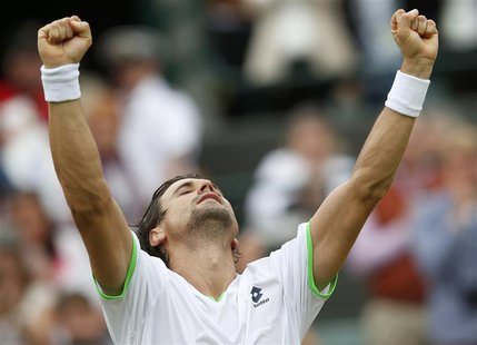 David Ferrer of Spain celebrates after defeating Roberto Bautista Agut of Spain in their men's singles tennis match at the Wimbledon Tennis David Ferrer of Spain celebrates after defeating Roberto Bautista Agut of Spain in their men's singles tennis match at the Wimbledon Tennis