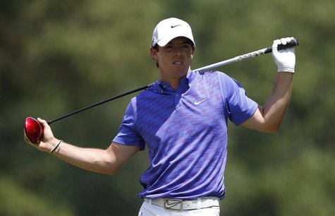 Northern Ireland's Rory McIlroy reacts after hitting his seond shot on the second tee during the third round of the 2013 U.S. Open golf cham Northern Ireland's Rory McIlroy reacts after hitting his seond shot on the second tee during the third round of the 2013 U.S. Open golf cham