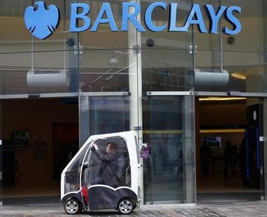 A woman sits in her mobility scooter outside a Barclays Bank in Leicester, central England April 24, 2013. REUTERS/Darren Staples A woman sits in her mobility scooter outside a Barclays Bank in Leicester, central England April 24, 2013. REUTERS/Darren Staples