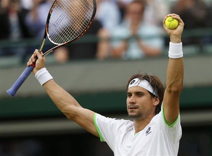 David Ferrer of Spain celebrates after defeating Roberto Bautista Agut of Spain in their men's singles tennis match at the Wimbledon Tennis David Ferrer of Spain celebrates after defeating Roberto Bautista Agut of Spain in their men's singles tennis match at the Wimbledon Tennis