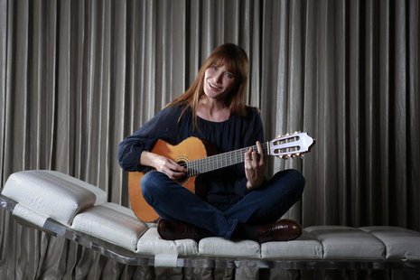 Singer Carla Bruni-Sarkozy sings as she poses for a portrait to promote her new album "Little French Songs" in New York, June 25, 2013. REUT Singer Carla Bruni-Sarkozy sings as she poses for a portrait to promote her new album "Little French Songs" in New York, June 25, 2013. REUT