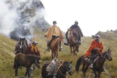 Andean people ride their horses during a protest march against Newmont Mining's Conga project, along the Perol lake in Peru's region of Caja Andean people ride their horses during a protest march against Newmont Mining's Conga project, along the Perol lake in Peru's region of Caja