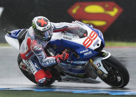 Yamaha MotoGP rider Jorge Lorenzo of Spain takes a curve during the free practice session of the Dutch Grand Prix in Assen June 27, 2013. RE Yamaha MotoGP rider Jorge Lorenzo of Spain takes a curve during the free practice session of the Dutch Grand Prix in Assen June 27, 2013. RE
