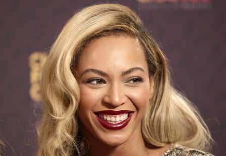 Singer Beyonce poses for photographs at "The Sound of Change" concert at Twickenham Stadium in London June 1, 2013. REUTERS/Neil Hall Singer Beyonce poses for photographs at "The Sound of Change" concert at Twickenham Stadium in London June 1, 2013. REUTERS/Neil Hall