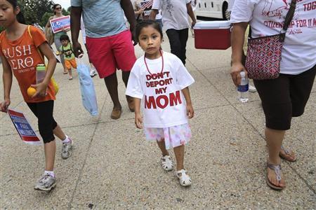 A girl wears a "Don't Deport My Mom t-shirt" as she joins immigrants and activists, led by Service Employees International Union (SEIU) and CASA, as they chant and march to urge congress to act on More...
Credit: REUTERS/Jonathan Ernst A girl wears a "Don't Deport My Mom t-shirt" as she joins immigrants and activists, led by Service Employees International Union (SEIU) and CASA, as they chant and march to urge congress to act on More...
Credit: REUTERS/Jonathan Ernst