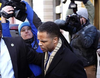 Former U.S. Rep. Jesse Jackson Jr. (C) departs the U.S. District Federal Courthouse in Washington February 20, 2013. REUTERS/Gary Cameron Former U.S. Rep. Jesse Jackson Jr. (C) departs the U.S. District Federal Courthouse in Washington February 20, 2013. REUTERS/Gary Cameron