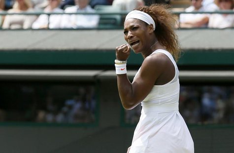 Serena Williams of the U.S. reacts to breaking serve in the second set during her women's singles tennis match against Caroline Garcia of Fr Serena Williams of the U.S. reacts to breaking serve in the second set during her women's singles tennis match against Caroline Garcia of Fr