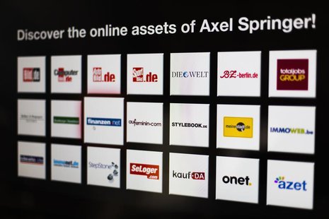Logos of the digital products of the Axel Springer media group are presented before a news conference on annual results in Berlin March 6, 2 Logos of the digital products of the Axel Springer media group are presented before a news conference on annual results in Berlin March 6, 2
