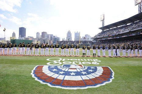 The Pittsburgh Pirates listen to the national anthem before playing against the Chicago Cubs in their opening day MLB National League baseba The Pittsburgh Pirates listen to the national anthem before playing against the Chicago Cubs in their opening day MLB National League baseba
