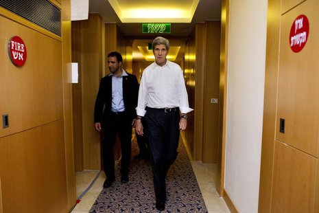 U.S. Secretary of State John Kerry (front) returns to his hotel room after a meeting with Israeli Prime Minister Benjamin Netanyahu in Jerus U.S. Secretary of State John Kerry (front) returns to his hotel room after a meeting with Israeli Prime Minister Benjamin Netanyahu in Jerus