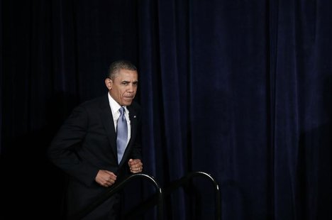 U.S. President Barack Obama takes the stage to speak about the Affordable Care Act during a visit to San Jose, California June 7, 2013. REUT U.S. President Barack Obama takes the stage to speak about the Affordable Care Act during a visit to San Jose, California June 7, 2013. REUT