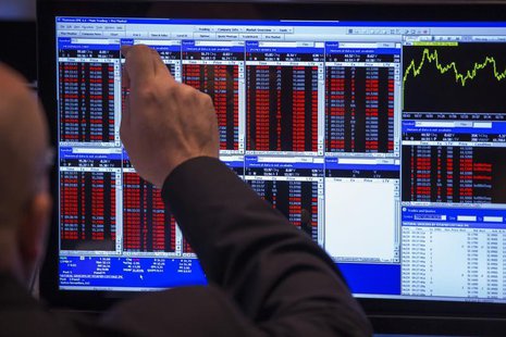 A trader works on the floor of the New York Stock Exchange shortly after the start of trading in New York June 28, 2013. REUTERS/Lucas Jacks A trader works on the floor of the New York Stock Exchange shortly after the start of trading in New York June 28, 2013. REUTERS/Lucas Jacks
