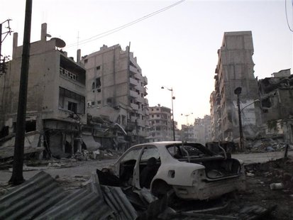A damaged car is seen in the Al-khalidiya neighbourhood of Homs June 30, 2013. REUTERS/Yazan Homsy A damaged car is seen in the Al-khalidiya neighbourhood of Homs June 30, 2013. REUTERS/Yazan Homsy