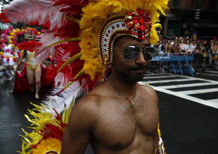 A man marches in the Gay Pride Parade in New York June 30, 2013. REUTERS/Eric Thayer A man marches in the Gay Pride Parade in New York June 30, 2013. REUTERS/Eric Thayer