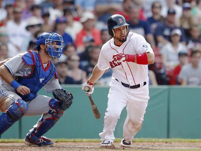 Boston Red Sox's Shane Victorino grounds into a fielding error to drive in the walk-off run in the ninth inning against the Toronto Blue Jay Boston Red Sox's Shane Victorino grounds into a fielding error to drive in the walk-off run in the ninth inning against the Toronto Blue Jay